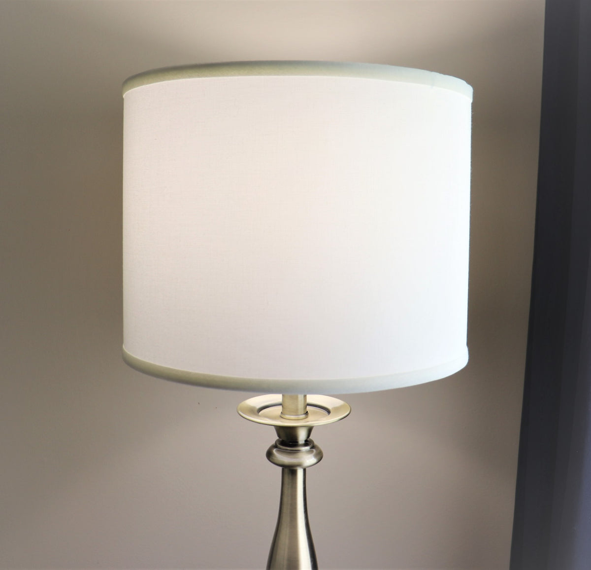 Cream linen drum shade.