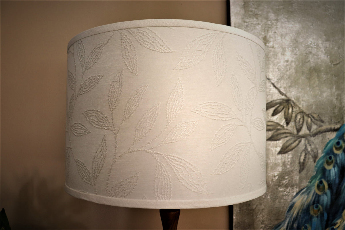 Warm white, leaf embossed, drum.